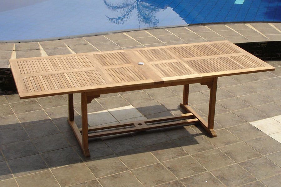 Teak double extensions dining table