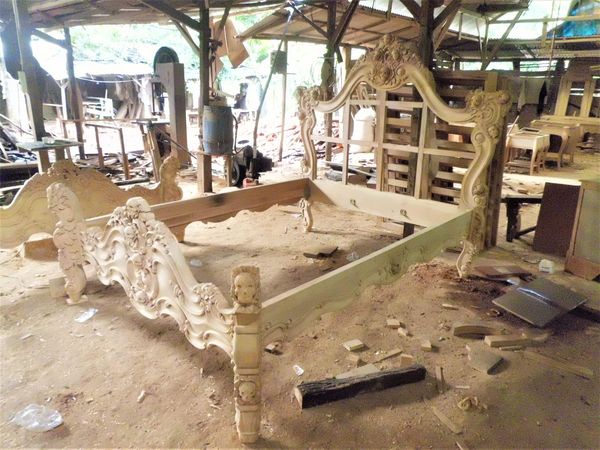 Custom made cranium carbing bed teak wood