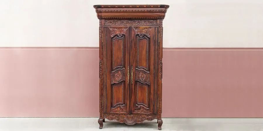 French antique armoire reproduction made of mahogany wood.